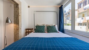 The bedroom comes with large windows that let in tons of natural light throughout the day! #airbnb #airbnblisbon #portugal #pt #lisbon