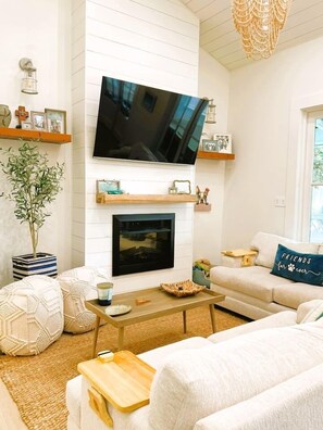 Living Room with Big Screen TV and Fireplace