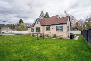 Fenced yard and bbq.