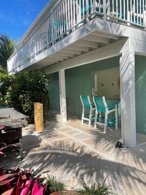 Grill Station with backup propane tank and ample outdoor seating
