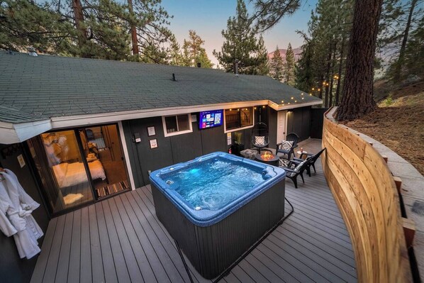 The Tahoe House is a 1400+ sq. ft. 3 bedroom 2 bathroom mountain home with a 1-car garage and private hot tub and outdoor TV conveniently located in close proximity to Heavenly Ski Resort and everything Lake Tahoe has to offer. 