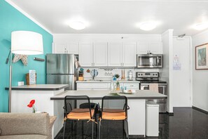 Prepare your favorite meals in your fully equipped kitchen and share them with loved ones in the dining area.
