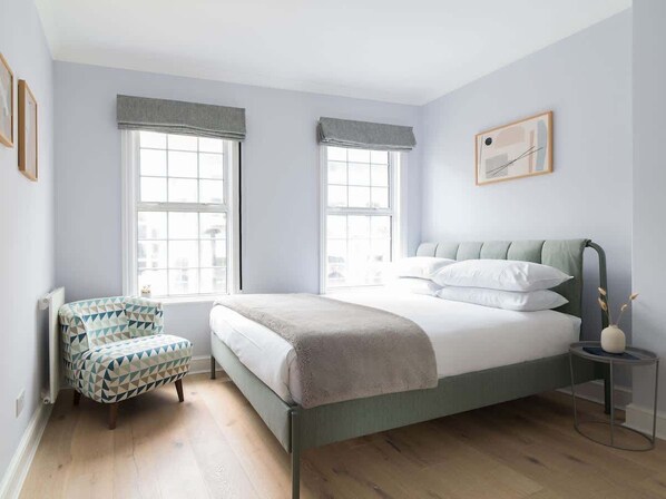 King size bed with medium firm mattress and memory foam top.