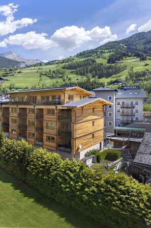 Cloud, Sky, Plant, Building, Window, Mountain, Highland, Tree, Wood, Urban Design