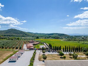 Sky, Cloud, Plant, Mountain, Land Lot, Natural Landscape, Tree, Urban Design, Grass, Plain