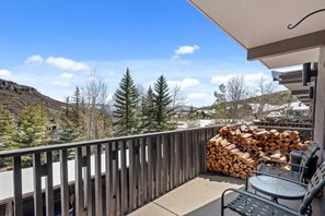 Relax on the patio and enjoy the cool shade and beautiful views while preparing dinner on the gas grill.