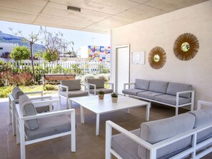 Plant, Furniture, Property, Couch, Table, Interior Design, Lighting, Living Room, Studio Couch, Floor