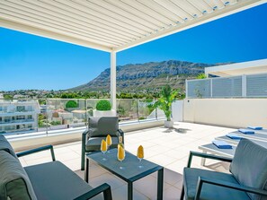 Furniture, Sky, Property, Table, Blue, Chair, Building, Shade, Azure, Interior Design