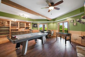 Large game room - air hockey, ping pong, foosball, darts and card table