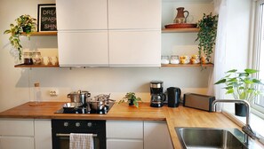 Bright kitchen in scandinavian boho design