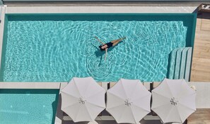 The 80m2 infinity pool (non heated) with hydromassage features.
