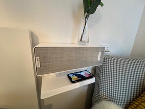 SONOS wireless audio system with phone charging
