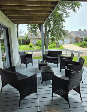 Seats 8.  Enjoy the shade, shake off the work week and fire up the grill! 