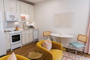 Eat in kitchen with fridge, microwave, oven, range, dishwasher, & toaster oven.