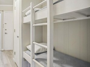 bunk beds located in hallway 