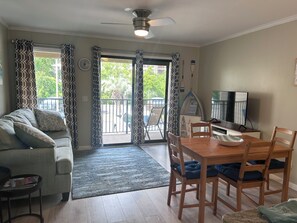 Living room with walk out balcony