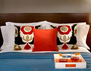 Bold and beautiful bedroom decor with striking accents, creating an energetic yet comfortable atmosphere.