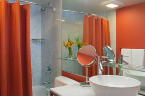 Modern bathroom with bright details, offering a refreshing and cheerful start to the day with sleek amenities.
