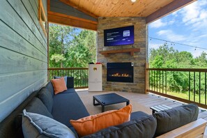 [outdoor patio] Beautiful outdoor sitting space with fireplace