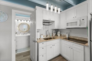 Kitchenette with Microwave, Stovetop, Full Size Refrigerator and Keurig Coffee Machine