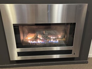 The gas fire place heats up the chalet in minutes.