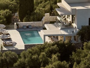 This luxury Villa is blissfully tucked away commanding landmark views.