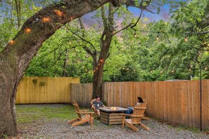 4 Adirondak chairs provide seating for friends, family, or that special someone .