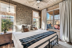 The second bedroom on the main level has a brand new king size bed and an attached bathroom.