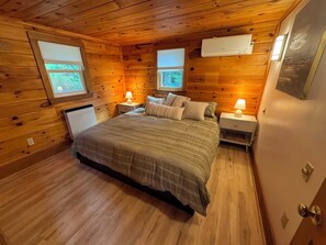 **King Bed in Master Bedroom**: The cozy master bedroom features a comfortable king-sized bed, perfect for restful nights.
