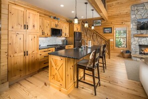 The kitchen is modern and well equipped for preparing full meals.