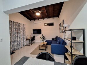 Living room & Dedicated Workspace with AC & TV