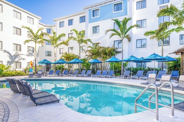 Outdoor pool and sun loungers
