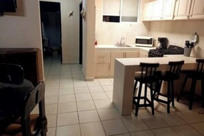 kithcen and at the back door to bathroom and bedroom