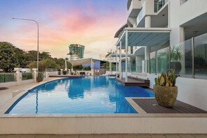 Make a splash in the sparkling swimming pool, located within the building.
