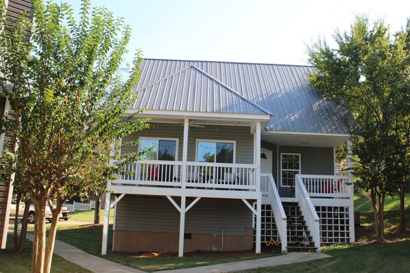 Back of house facing pool