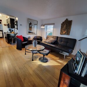 Keep the chef company from the living room in the bright, open-plan space.