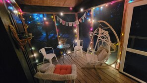 Be serenaded by crickets as you watch fireflies, rocking in the rocker or swing