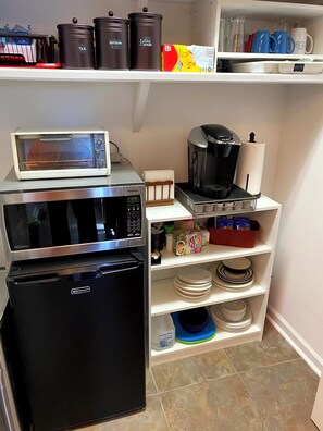 Kitchenette (in bathroom closet) - Microwave, Mini Fridge, Toaster Oven, Keurig