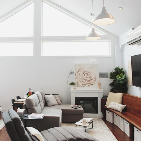 The beautiful main room is bright, airy and comfortable