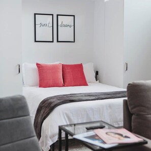 Lay down in a comfortable queen sized murphy bed