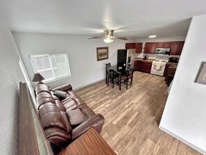 Updated kitchen and living room with a sleeper sofa