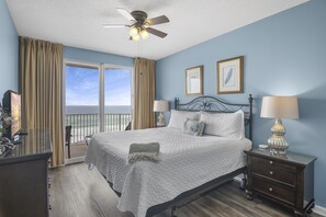 Big Gulf views from the primary bedroom which features a King Bed, Smart TV, large closet, and private bathroom with dual vanity