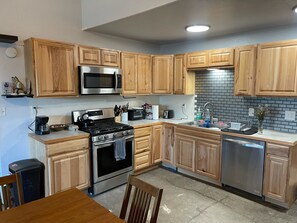Fully equipped kitchen with all utensils provided.