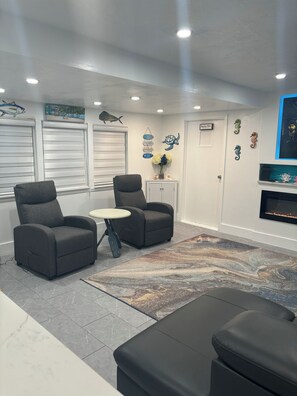 Living room, sitting area, relax, enjoy amazing convos over coffee or wine!