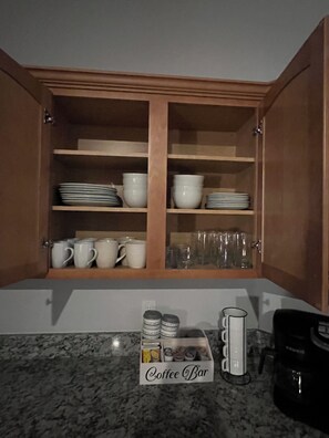 Everything you could possibly need.  All glasses, plates, bowls, pots and pans