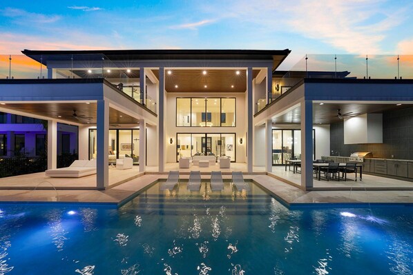 Le Maison Blanc - Luxury Waterfront Vacation Rental House with Private Pool, Hot Tub, Fireplace, and In-Home Movie Theater in Miramar Beach, Florida - Five Star Properties Destin/30A