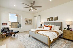 Wind down in the king-sized bed in the primary bedroom.