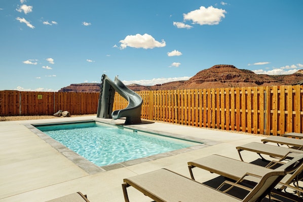 Your own private pool and slide with the best red rock views around!