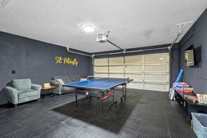 Those who aren't fans of ping pong can relax on the sofa and watch TV (43 inch).