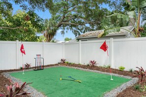Enjoy a game of mini golf with your loved one. It's great for kids too!